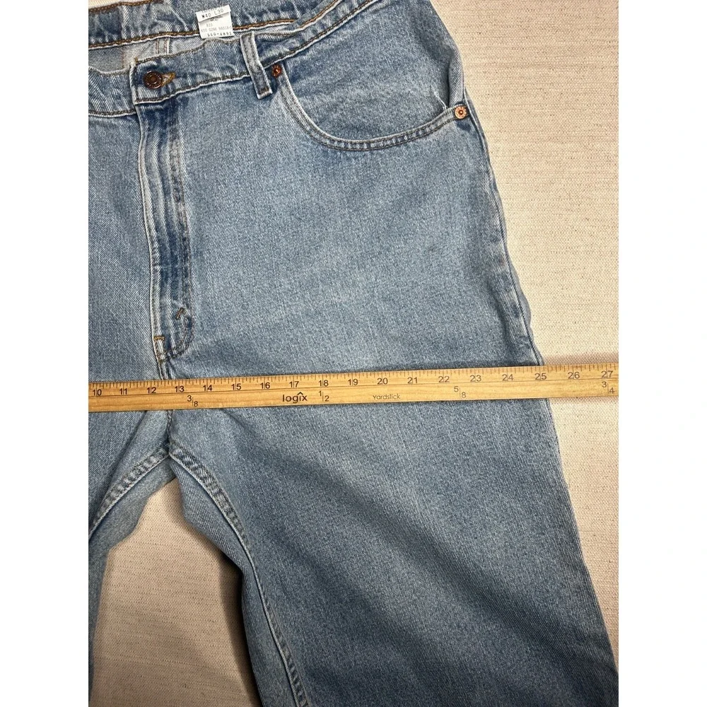 Vintage Levi's 560 Loose Fit Jeans Men's 40x30 USA Made Tapered Leg Light Wash